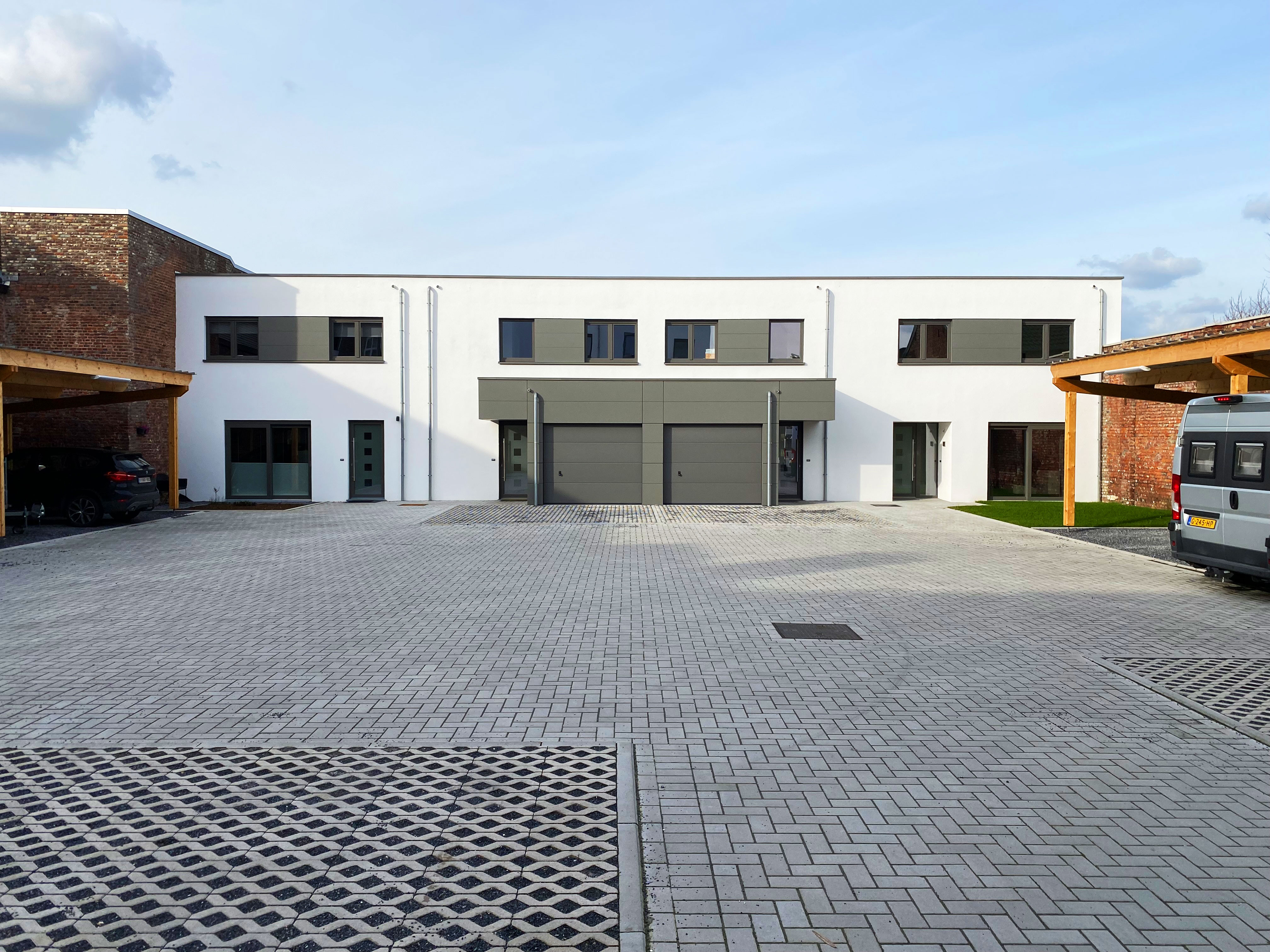 Beeld van een wooncomplex van 6 appartementen en 5 woongelegenheden - Plein in Moelingen